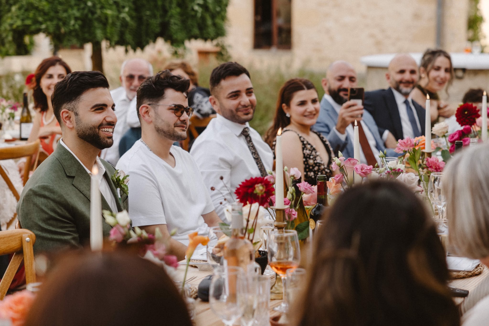 Wedding guests around a long dining table