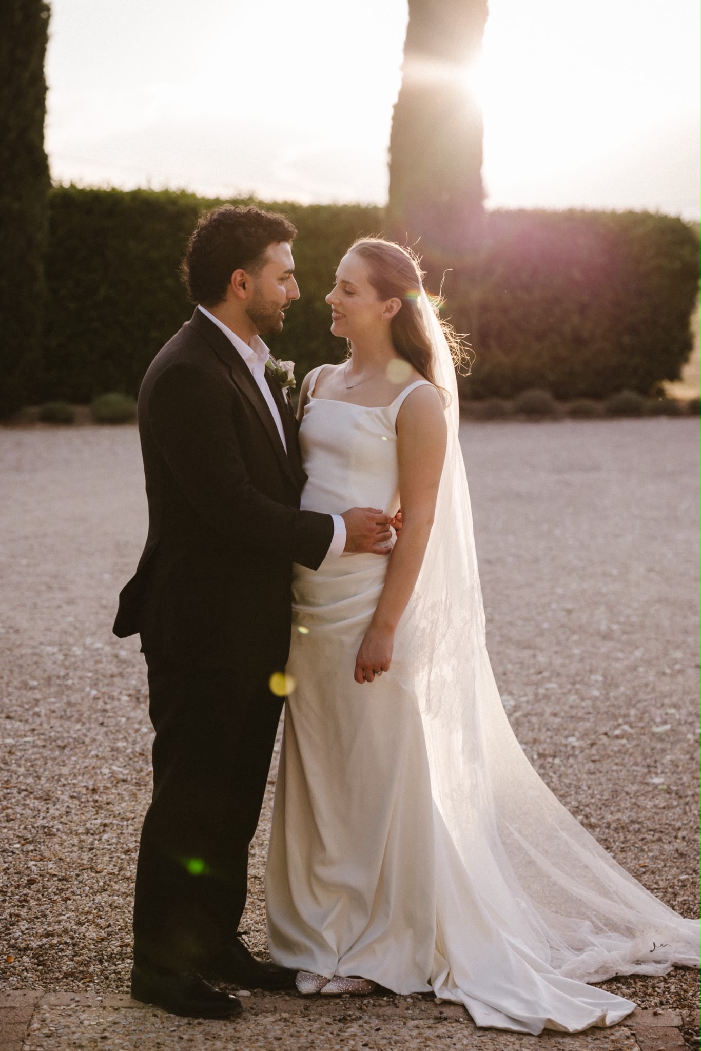Bride and groom together in the evening light